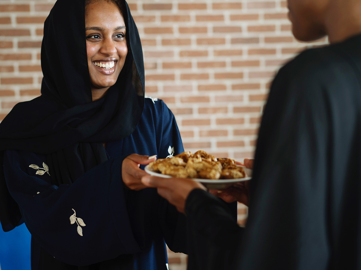 Halal home cook sharing food with family